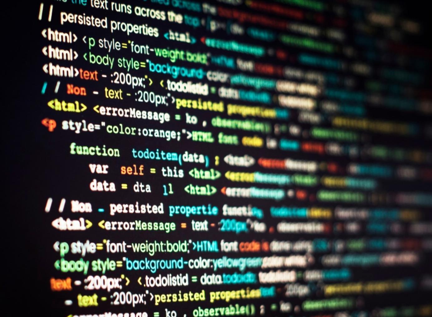 Student reviewing GraphQL resolver code with annotated performance metrics